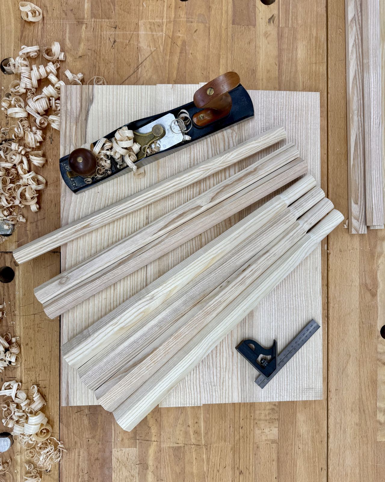 Chair components laid out on a workbench